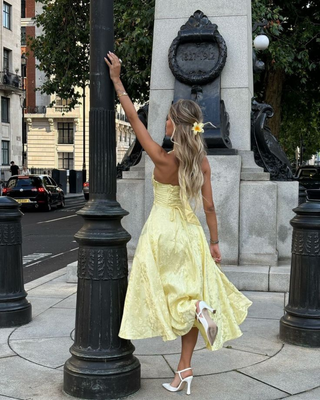 Olympia | Chic Sleeveless Midi Dress